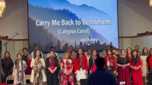 http://melodiesofprayer.com/NGSDA/2022-12-ChristmasConcert/Thumbnails/15 Carry Me Back To Bethlehem(Calypso Carol) - Joel Raney - MT - EDIT.jpg